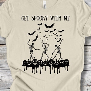 Dancing Skeleton Halloween Unisex Jersey Short Sleeve Tee, Skeletons Dancing In A Spooky Pumpkin Patch Graveyard.