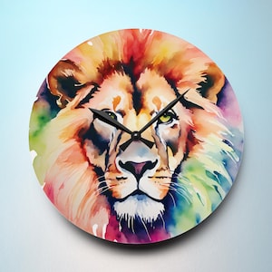 May include: Round wall clock featuring a watercolor painting of a lion's face. The lion's mane is a blend of red, orange, and yellow hues, with green eyes and a white muzzle. Black clock hands indicate the time.