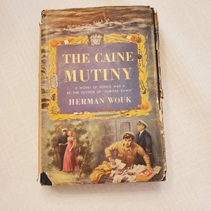 The Caine Mutiny by Herman Wouk. 1951 book club edition. Very good condition. Worn dust jacket.
