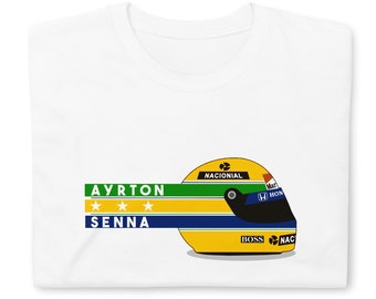 May include: White t-shirt with a yellow, green, and blue racing helmet graphic and the text "AYRTON SENNA" with three stars.