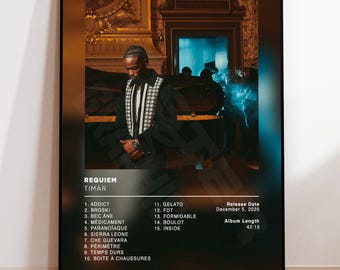 May include: A framed poster featuring the album "Requiem" by Timar. The image shows a man in a black jacket with a white and black patterned design. The poster includes a tracklist, release date, and album length.