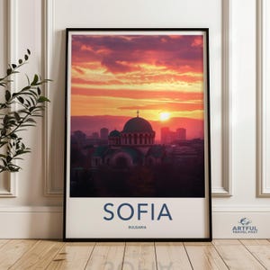 May include: A travel poster with a photograph of a church in Sofia, Bulgaria, with a sunset in the background. The poster has the text "SOFIA" and "BULGARIA" in blue.