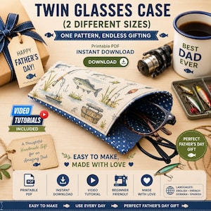 May include: A glasses case with a fishing theme, featuring a detailed illustration of fish, fishing rods, and tackle. The case is open, revealing a pair of glasses. The text reads "Twin Glasses Case" and "Happy Father's Day!"