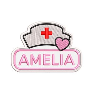 May include: An embroidered patch featuring a white nurse cap with a red cross and a pink heart. Below the cap is a white rectangular name tag with a pink border containing the name AMELIA in pink capital letters with a white background.