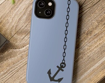 May include: A light blue phone case with a black anchor and chain design.