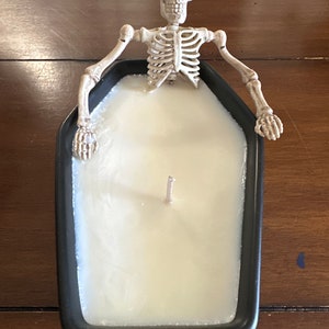 Skeleton coffin candle
