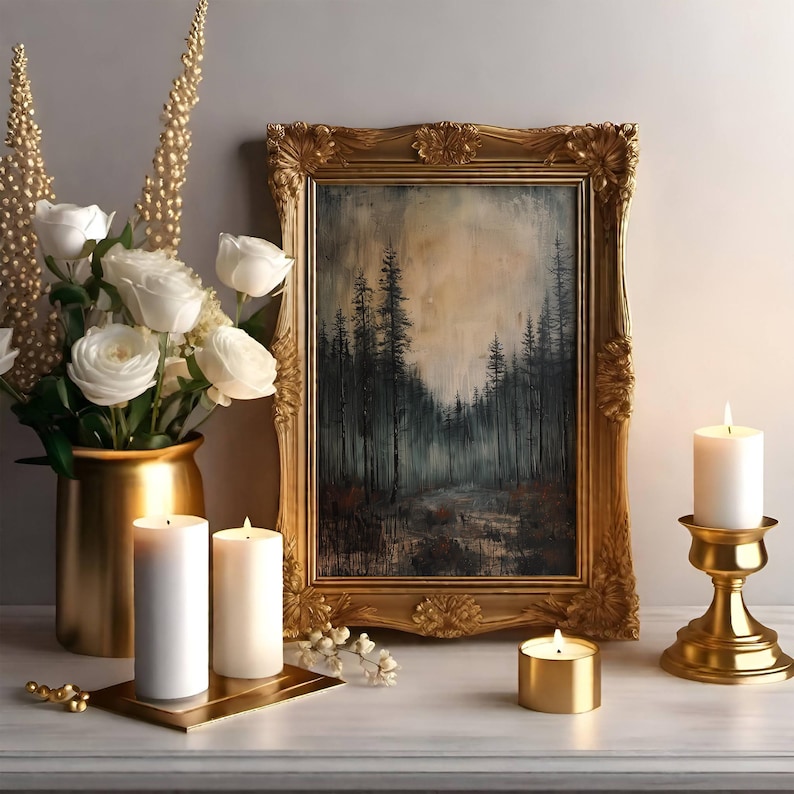 May include: A gold framed painting of a forest scene with white candles on a table. The candles are on a gold stand and a gold tray.