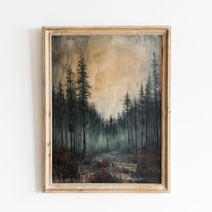 May include: A framed painting of a forest scene with tall, dark trees and a light brown sky. The trees are silhouetted against the sky, and the painting has a moody, atmospheric feel.