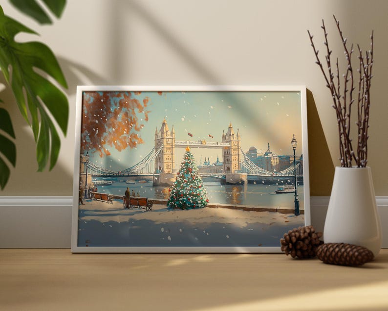 May include: A framed painting of a snowy scene with a Christmas tree in front of Tower Bridge in London. The bridge is decorated with lights and there are people walking across it.