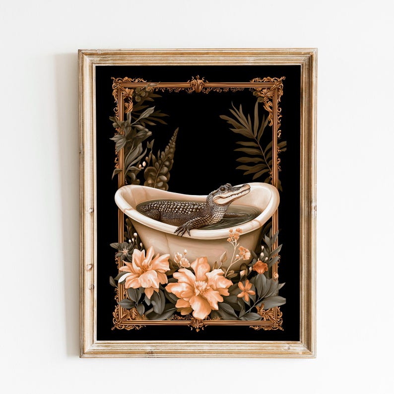 May include: Framed art print depicting an alligator in a vintage bathtub. The artwork has a black background with a gold ornate frame, peach-coloured flowers, and green foliage. The alligator is in the tub with water, creating a whimsical scene.