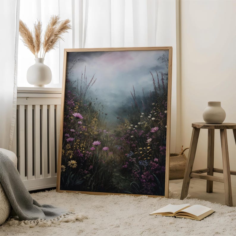 May include: A framed print of a misty forest scene with a path leading through a field of purple and yellow wildflowers.