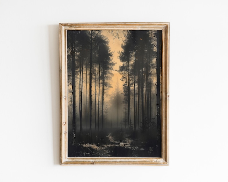 May include: A framed print of a forest scene with tall trees and a misty path leading into the distance. The trees are silhouetted against a golden sky, creating a dramatic and atmospheric effect.