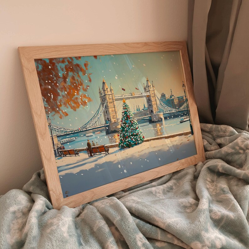 May include: A framed painting of a snowy scene with Tower Bridge in London, England. A Christmas tree is in the foreground with a couple walking by.
