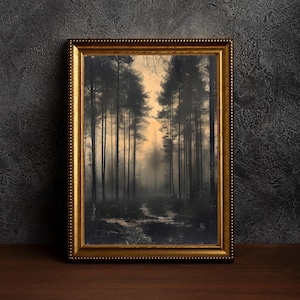 May include: A framed photograph of a misty forest path with tall trees on either side. The path leads into the distance, and the light from the setting sun casts a warm glow on the scene.