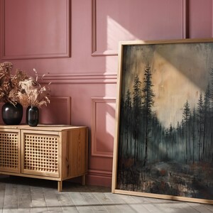 May include: A wooden cabinet with two doors featuring a woven lattice design. The cabinet is in front of a pink wall with a framed painting of a forest scene. The painting features a dark, moody forest with tall trees and a hazy sky.