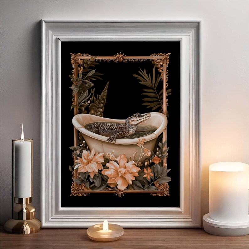 May include: A framed art print depicting an alligator in a bathtub. The artwork has a black background with a gold ornate frame, surrounded by floral and botanical elements. The color palette includes shades of brown, beige, and green.