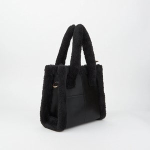 Felltasche schwarz clearance