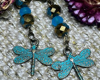 Crystal glass and dragonfly charm earrings