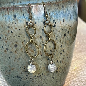 Colorful “yellow turquoise” gemstone and geometric circle earrings.