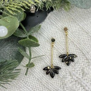 Black and gold leaf lotus leaves with gold bar and on gold plated stainless steal circular stud posts  | Handmade Polymer Clay Earrings