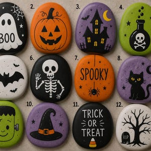 Peut inclure: Un ensemble de douze pierres lisses et arrondies peintes avec des motifs d'Halloween, incluant un fantôme blanc avec le texte BOO, une citrouille orange, une maison hantée violette, une potion verte, une chauve-souris, un squelette, une araignée, un chat, Frankenstein, un chapeau, le texte TRICK OR TREAT et un arbre avec une pierre tombale.