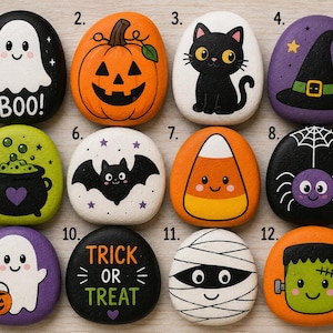 Peut inclure: Un ensemble de douze pierres lisses et arrondies peintes avec des illustrations sur le thème d'Halloween, incluant un fantôme avec le texte BOO!, une citrouille, un chat noir, un chapeau de sorcière, un chaudron, une chauve-souris, un bonbon, une araignée, un fantôme avec un seau, le texte TRICK OR TREAT, une momie et Frankenstein.