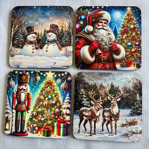 May include: Set of four square Christmas-themed coasters. The first coaster features two snowmen standing in a snowy forest. The second coaster features Santa Claus holding a bag of gifts in front of a Christmas tree. The third coaster features a nutcracker standing next to a Christmas tree. The fourth coaster features two reindeer standing in a snowy forest.