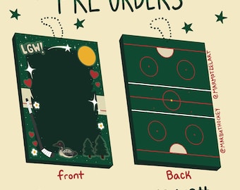 May include: Two rectangular green ornaments with a chain loop. The front features a hockey stick, a loon, pine trees, hearts, stars, and the text LGW. The back displays a hockey rink layout with red lines and circles. Text reads PRE-ORDERS OPEN UNTIL NOV 13th.