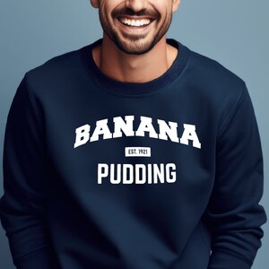 Felpa con budino alla banana: regalo gastronomico in stile vintage universitario