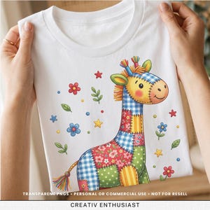 May include: White t-shirt featuring a patchwork giraffe design with floral and star accents. The giraffe has a blue and white checkered head and neck, with a colorful patchwork body. The text "CREATIV ENTHUSIAST" is at the bottom.