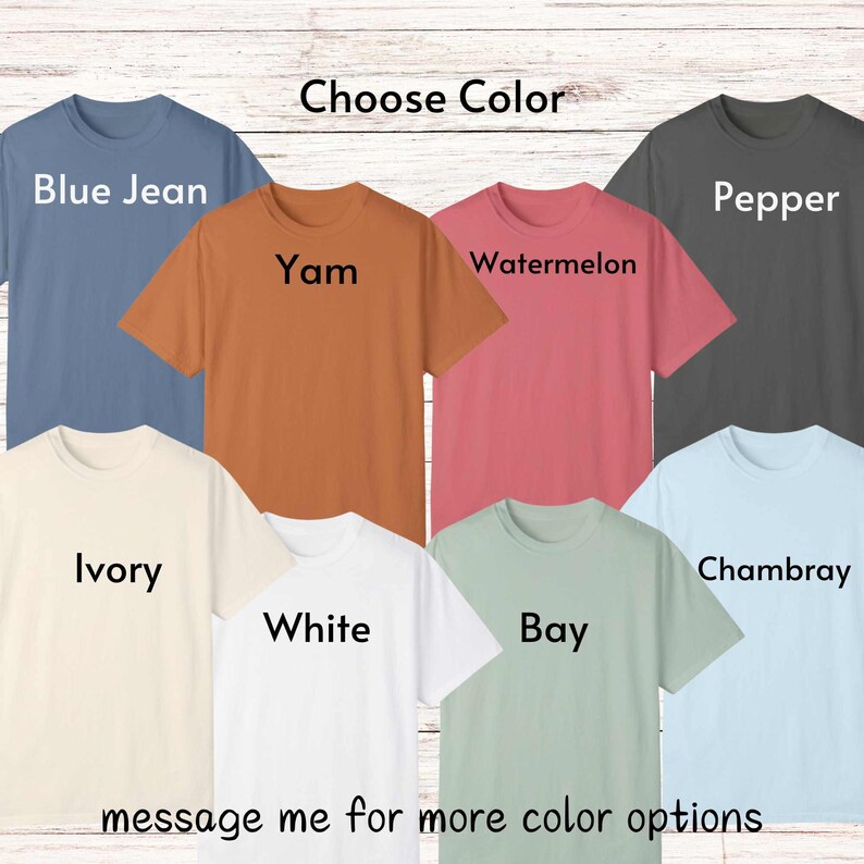 May include: A selection of t-shirts in various colors, including blue jean, pepper, yam, watermelon, ivory, white, bay, and chambray. The text "Choose Color" is at the top of the image. The text "message me for more color options" is at the bottom of the image.