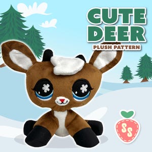 May include: A brown plush deer with large, expressive eyes and a white patch on its head. The deer has black hooves and ears, and a red nose. The image includes the text "CUTE DEER PLUSH PATTERN" and a strawberry logo.