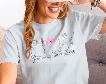 Camiseta "Vacunas salvan vidas": arte floral y concienciación sobre la salud pública