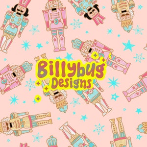 May include: A pink background with a repeating pattern of nutcracker soldiers and stars. The nutcrackers are in various poses and colors, with some wearing blue and gold and others wearing pink and gold. The text "Billybug Designs" is in the center of the image.