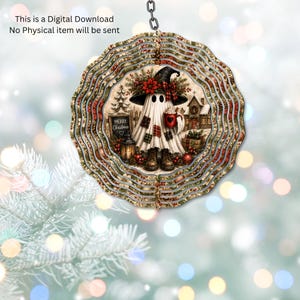 May include: A circular wind spinner featuring a ghost wearing a witch hat, boots, and a plaid-patched sheet, holding a red mug. The design includes a sign reading Merry Christmas, a lantern, and a snowy house. Text states: This is a Digital Download No Physical item will be sent.