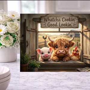May include: A rectangular wall art print featuring a rustic wooden window frame with the text Whatcha Cookin' Good Lookin' above it. The scene shows a piglet, a fluffy brown highland cow, and a chicken looking out toward a farm with a barn.