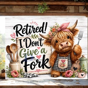 May include: A humorous illustration shows a Highland cow with a floral headband and apron, holding a fork. The sign says "Retired! I Don't Give a Fork." Wooden spoons and a jar are on the left. Pink and green accents.