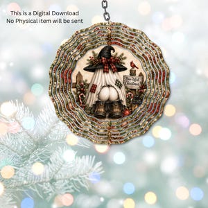 May include: A circular scalloped wind spinner featuring a graphic of a ghost wearing a witch hat, boots, and a red plaid bow. The ghost is standing near a sign that reads Boo-tiful Christmas. The text This is a Digital Download No Physical item will be sent is visible.