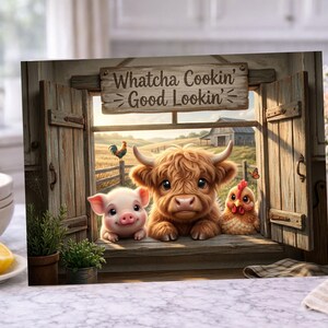 May include: A rectangular wall art print featuring a rustic wooden window frame with open shutters. The text "Whatcha Cookin' Good Lookin'" is displayed on a wooden sign above. A piglet, a highland calf, and a chicken sit on the window sill.