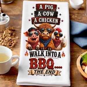 May include: White kitchen towel with a humorous BBQ design. The towel features a pig, cow, and chicken wearing sunglasses and bandanas. Text reads "A Pig, A Cow, A Chicken Walk Into A BBQ... The End".