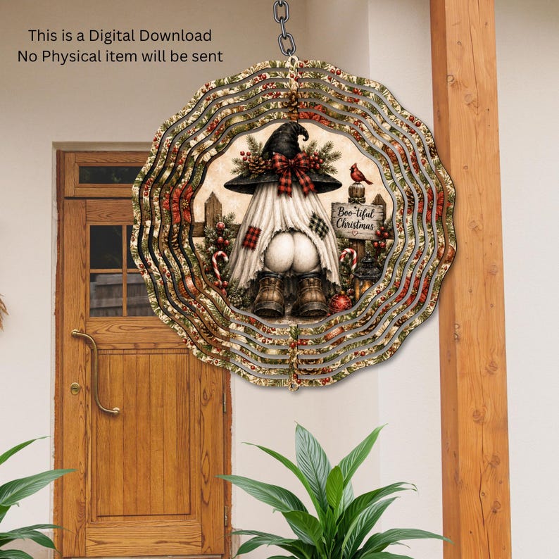 May include: A circular wind spinner featuring a ghost wearing a witch hat, boots, and a red plaid bow. The design includes a sign reading Boo-tiful Christmas, pine branches, berries, and candy canes. Text states: This is a Digital Download No Physical item will be sent.