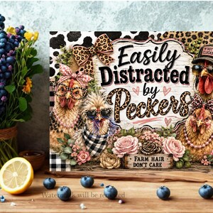 May include: A rectangular sign featuring four chickens wearing accessories like leopard print bows, glasses, and hats. The text reads "Easily Distracted by Peckers" and "FARM HAIR DON'T CARE" with pink hearts, leopard print accents, and floral illustrations.