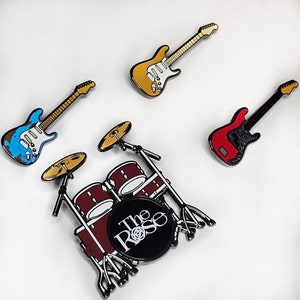 The Rose instrument enamel pins