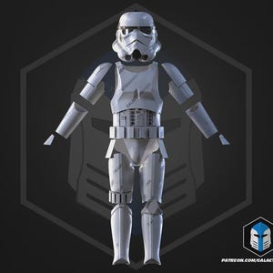 May include: A white Stormtrooper armour suit, featuring a helmet, chest plate, and leg armour. The suit is displayed against a dark background with a geometric design. The text "GALACTIC ARMORY" is visible on the armour. The image also includes a logo and a website address.