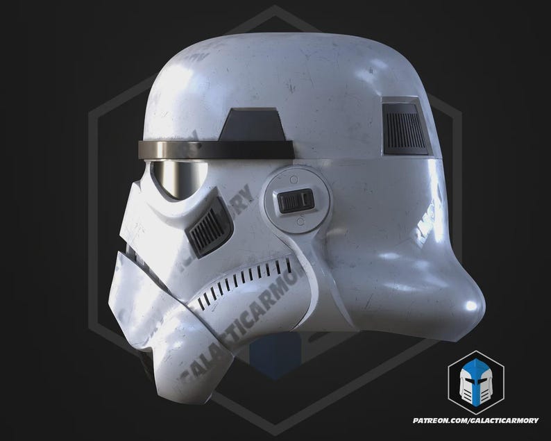 May include: A white and grey Stormtrooper helmet with black detailing. The helmet features a smooth, curved design with a visor, vents, and a circular control panel. This helmet is a prop from the Star Wars franchise.