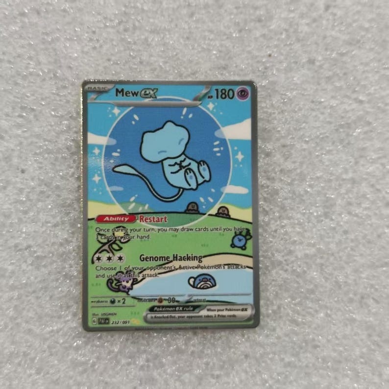 May include: A Mew ex trading card featuring a light blue Mew character centered in a blue circle against a sky background. The card displays 180 HP, the Ability Restart, and the Genome Hacking attack, with green grassy terrain and small illustrations of other creatures.