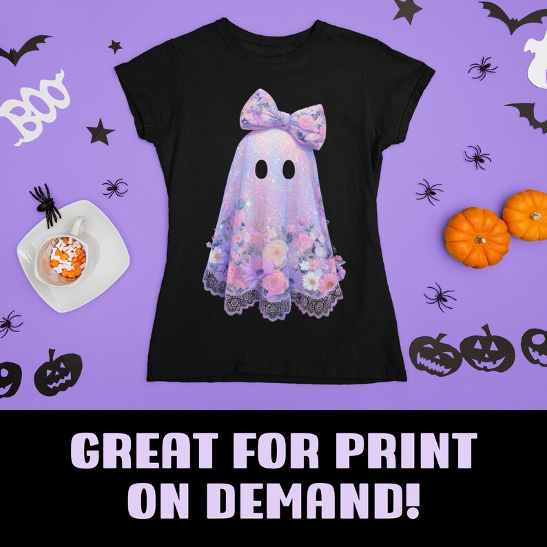 May include: Black t-shirt featuring a whimsical ghost design with a floral bow and floral accents. The ghost has two black oval eyes and is draped in a shimmering fabric. The text "GREAT FOR PRINT ON DEMAND!" is at the bottom.
