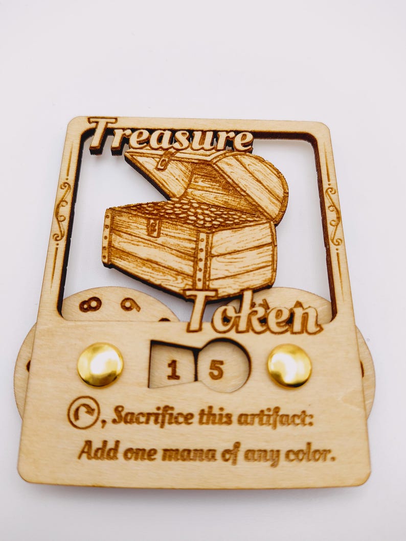 May include: A wooden treasure token with a carved image of a treasure chest. The token has a counter that reads "15" and the text "Sacrifice this artifact: Add one mana of any color."