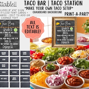 Op de afbeelding: Een bord van leisteen met de tekst "Taco Bar" en instructies voor het maken van een taco. Het bord is omringd door een verscheidenheid aan toppings voor taco's, waaronder gehakt, geraspte kip, kaas, uien, sla, salsa en zure room.