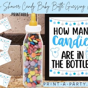 May include: A baby shower game set featuring a clear plastic baby bottle filled with colorful candies. The bottle has a yellow nipple and white cap. The set includes guessing game cards and a sign that reads "How Many Candies Are In The Bottle?"